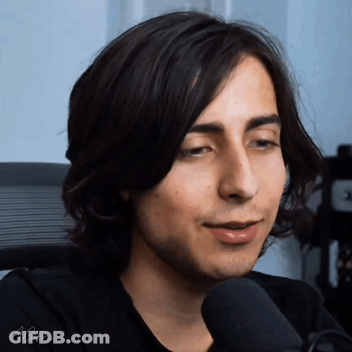 Smiling Man In Suit Eyes Closed Mouth Open GIF