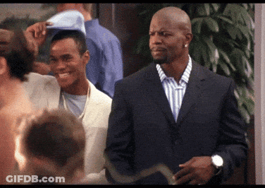 Smiling Man In Suit Next To Man With Hat GIF