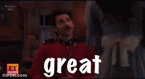 Smiling Man In Suit Saying Great To Woman GIF