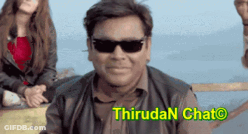 Smiling Man In Sunglasses In Front Of Thiruda Chat Sign GIF