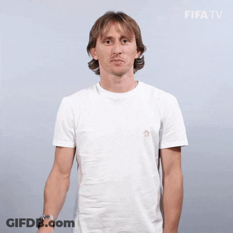 Smiling Man In White T-Shirt Waving At FIFA TV Logo GIF