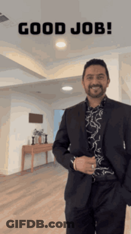 Smiling Man Pointing Up Great Work GIF