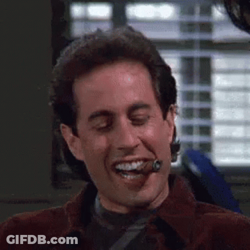 Smiling Man Smoking Cigar GIF