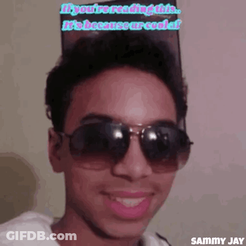 Smiling Man Wearing Sunglasses Says You're Cool GIF
