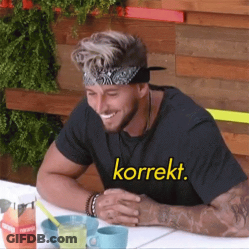 Smiling Man With Bandana And Korrekt Shirt GIF