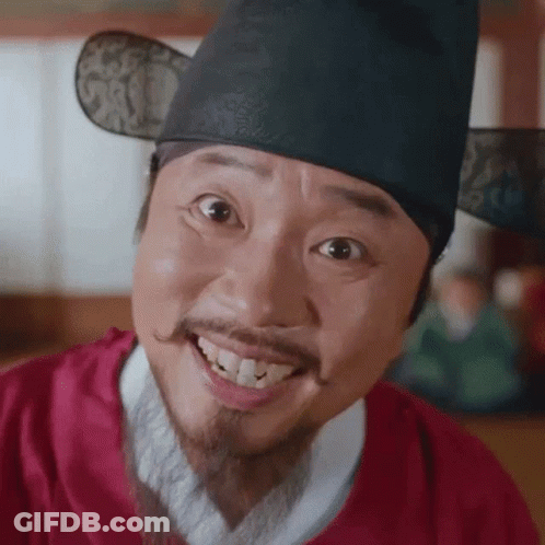 Smiling Man With Beard And Mustache In Red Shirt And Hat GIF