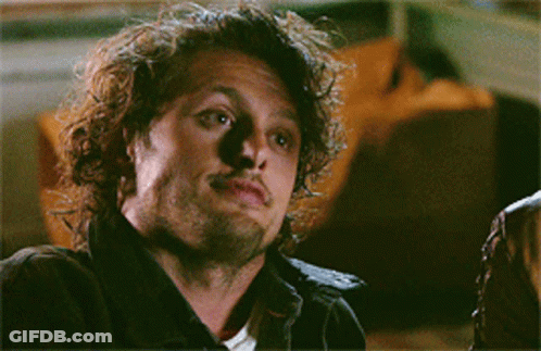Smiling Man With Curly Hair And Beard GIF