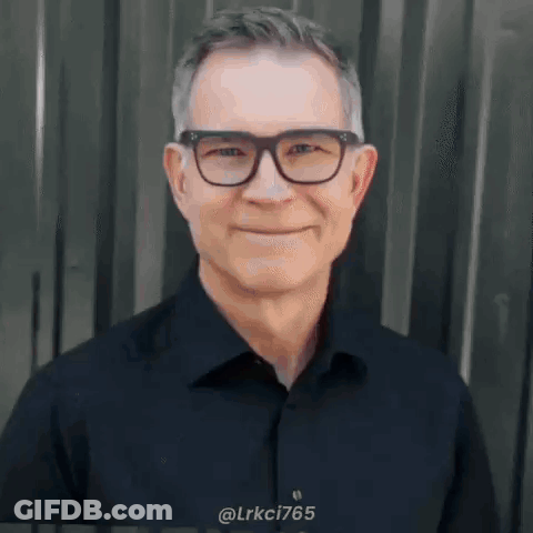 Smiling Man With Glasses And Black Shirt GIF
