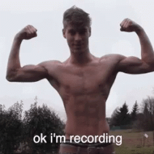 Smiling Man With Huge Muscle Growth GIF