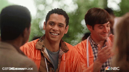 Smiling Orange Jacket Man Another In NBC Ad GIF