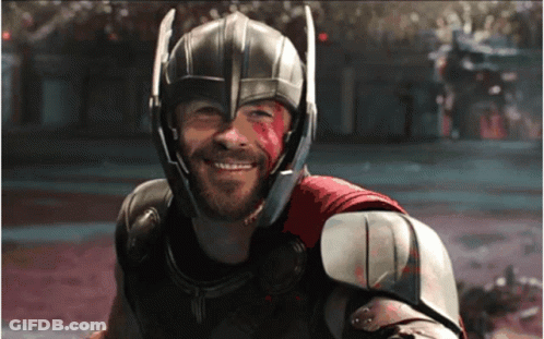Smiling Superhero With Bloody Helmet GIF