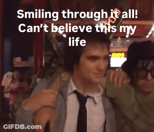 Smiling Through It All Can 'T Believe This My Life Written On A Picture GIF