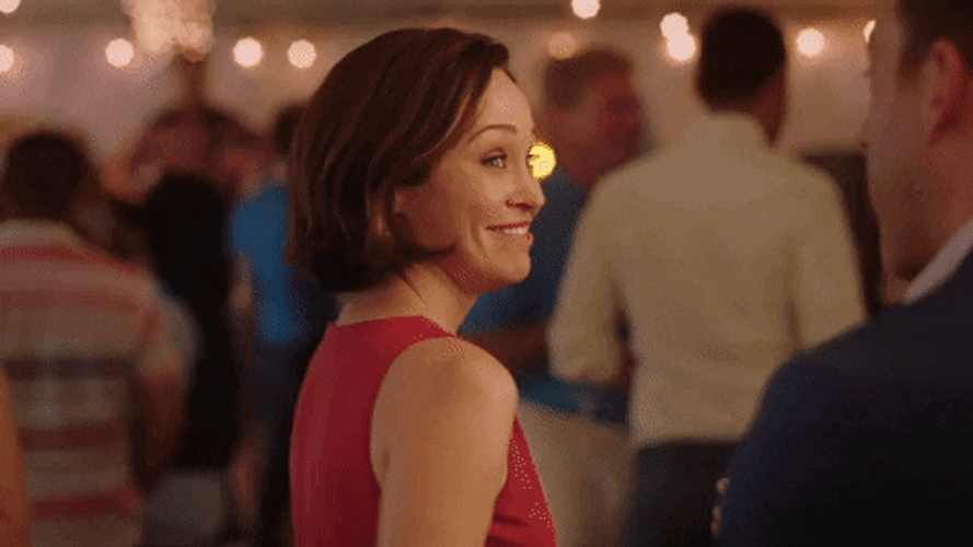 Smiling Woman Fingers Crossed GIF