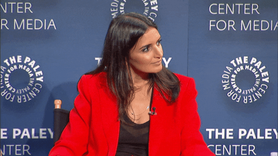 Smiling Woman Fingers Crossed GIF