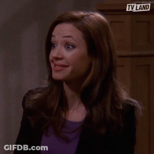 Smiling Woman In Purple Shirt TV Land Logo GIF