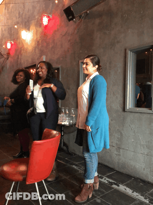 Smiling Woman Pointing GIF