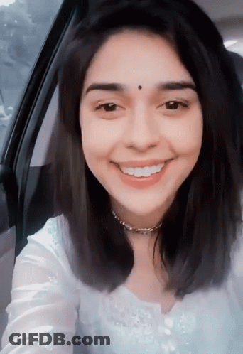 Smiling Woman Sitting In Car GIF
