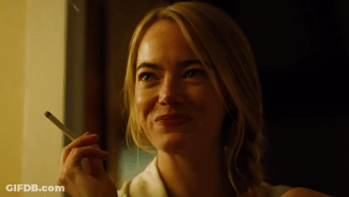 Smiling Woman Smoking Cigarette GIF