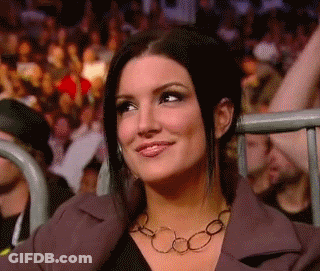 Smiling Woman Wearing Necklace GIF