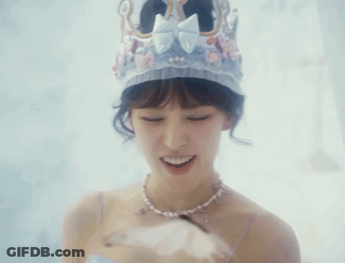 Smiling Woman With Crown And Necklace GIF