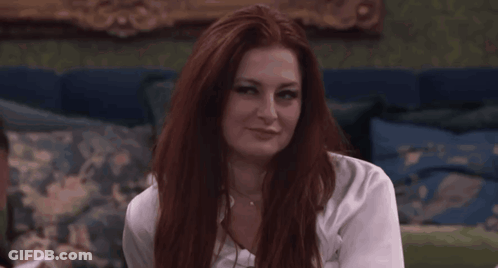 Smiling Woman With Red Hair And White Shirt GIF
