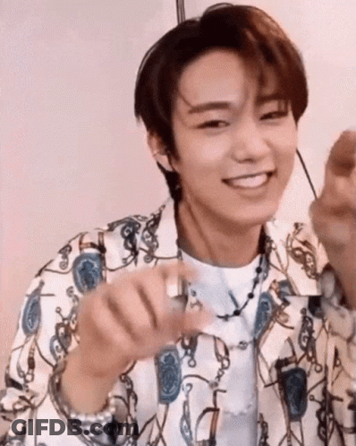 Smiling Young Man Holding Ring GIF