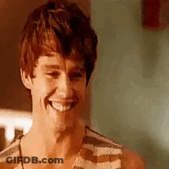 Smiling Young Man In Striped Tank Top GIF