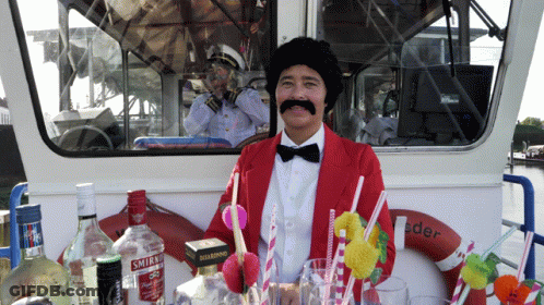 Smirnoff Vodka Next To Man In Red Jacket GIF