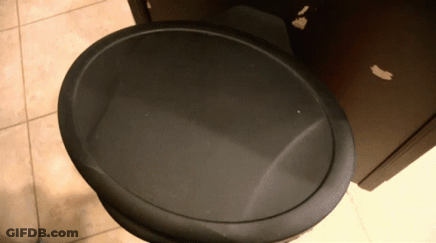 Sml Throwing Candy Corn On Garbage Can GIF