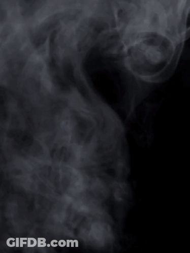 Smoke Coming Out Of A Fork On Black Background GIF