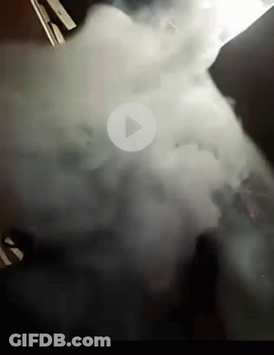 Smoke Filled Room With Play Button GIF
