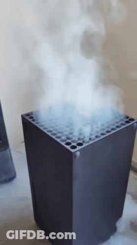 Smoke Is Coming Out Of The Top Of An Xbox GIF