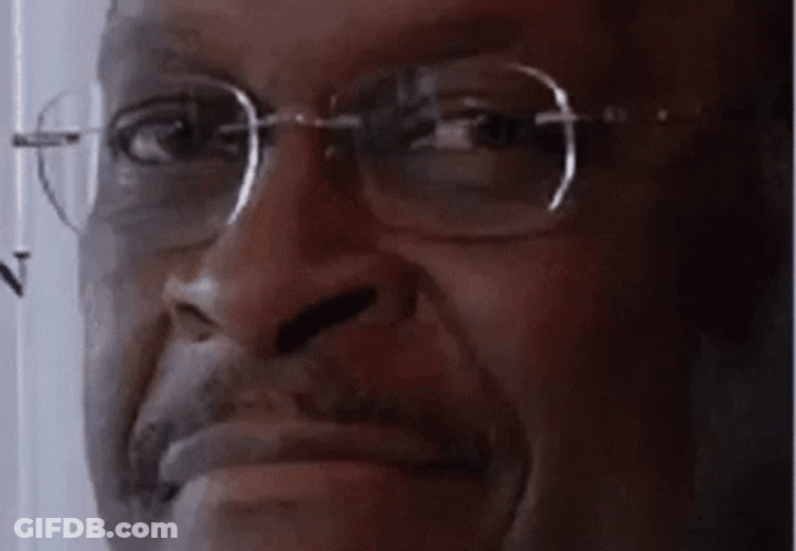 Smug Herman Cain Smiling GIF
