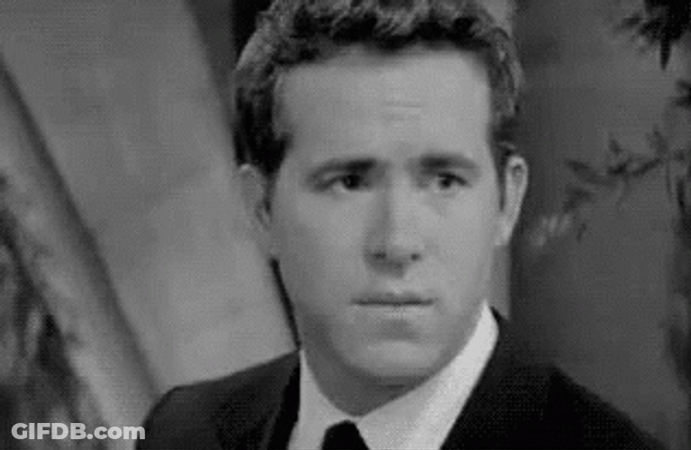 Smug Ryan Reynolds GIF