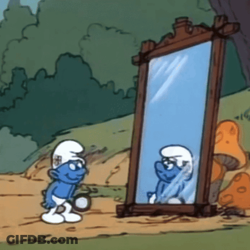 Smurf Looking At His Reflection In A Mirror GIF