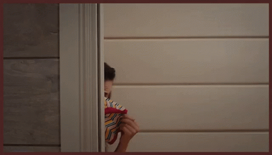 Sneaking Mischievous Lady Hiding Face GIF