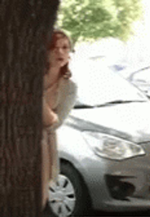 Sneaky Lady Stalker GIF