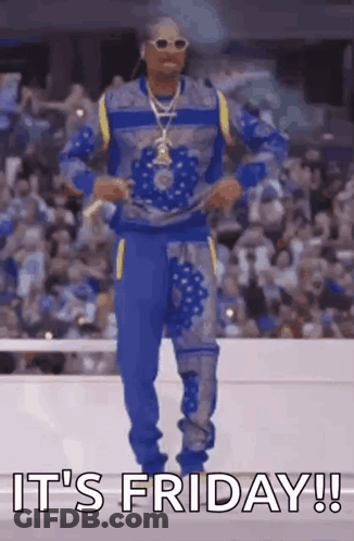 Snoop Dogg Is Dancing In Front Of A Crowd And The Words `` It 'S Friday '' Are Written On The Screen . GIF
