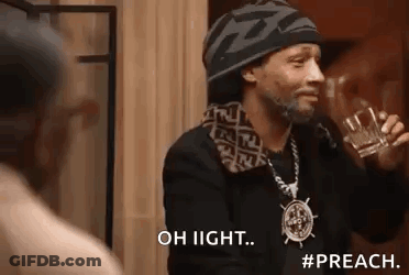 Snoop Dogg Is Drinking A Glass Of Whiskey And Talking To Someone . GIF
