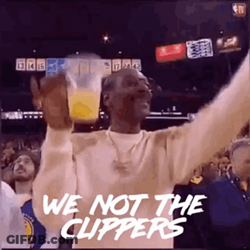 Snoop Dogg Is Holding A Cup Of Orange Juice In His Hand And Says `` We 'Re Not The Clippers '' . GIF