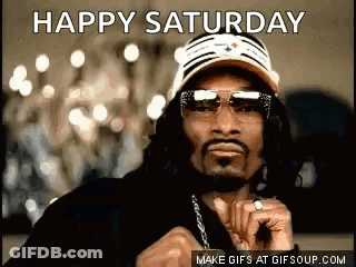 Snoop Dogg Is Wearing A Hat , Sunglasses , And A Ring . GIF
