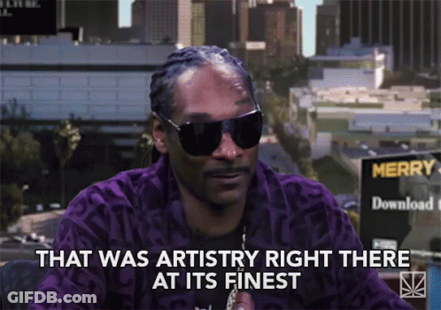 Snoop Dogg Is Wearing Sunglasses And A Purple Jacket And Says That Was Artistry Right There At Its Finest GIF