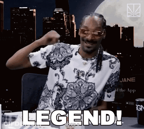 Snoop Dogg Is Wearing Sunglasses And A Shirt That Says Legend On It GIF