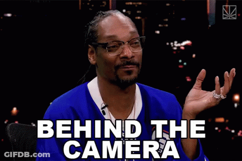 Snoop Dogg Says Behind The Camera While Wearing Glasses GIF