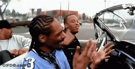 Snoop Dogg Sitting In Convertible With Two Men GIF