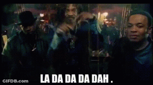Snoop Dogg Standing In Front Of Group Saying La Da Da Da Dah GIF
