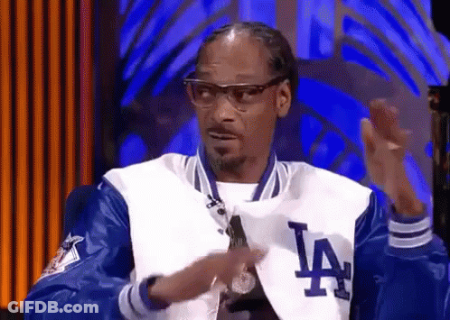 Snoop Dogg Wearing A La Dodgers Jacket And Glasses GIF