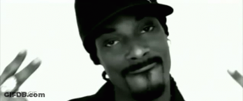 Snoop Dogg Wearing Hat Giving Peace Sign GIF