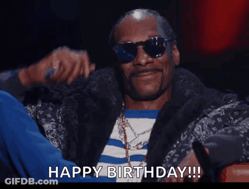 Snoop Dogg Wearing Sunglasses And A Ring Says Happy Birthday GIF