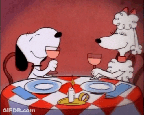 Snoopy And A Poodle Are Sitting At A Table With Plates And Wine Glasses . GIF